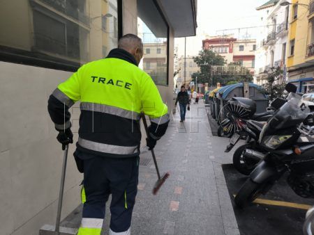 trabajador-trace-espalda