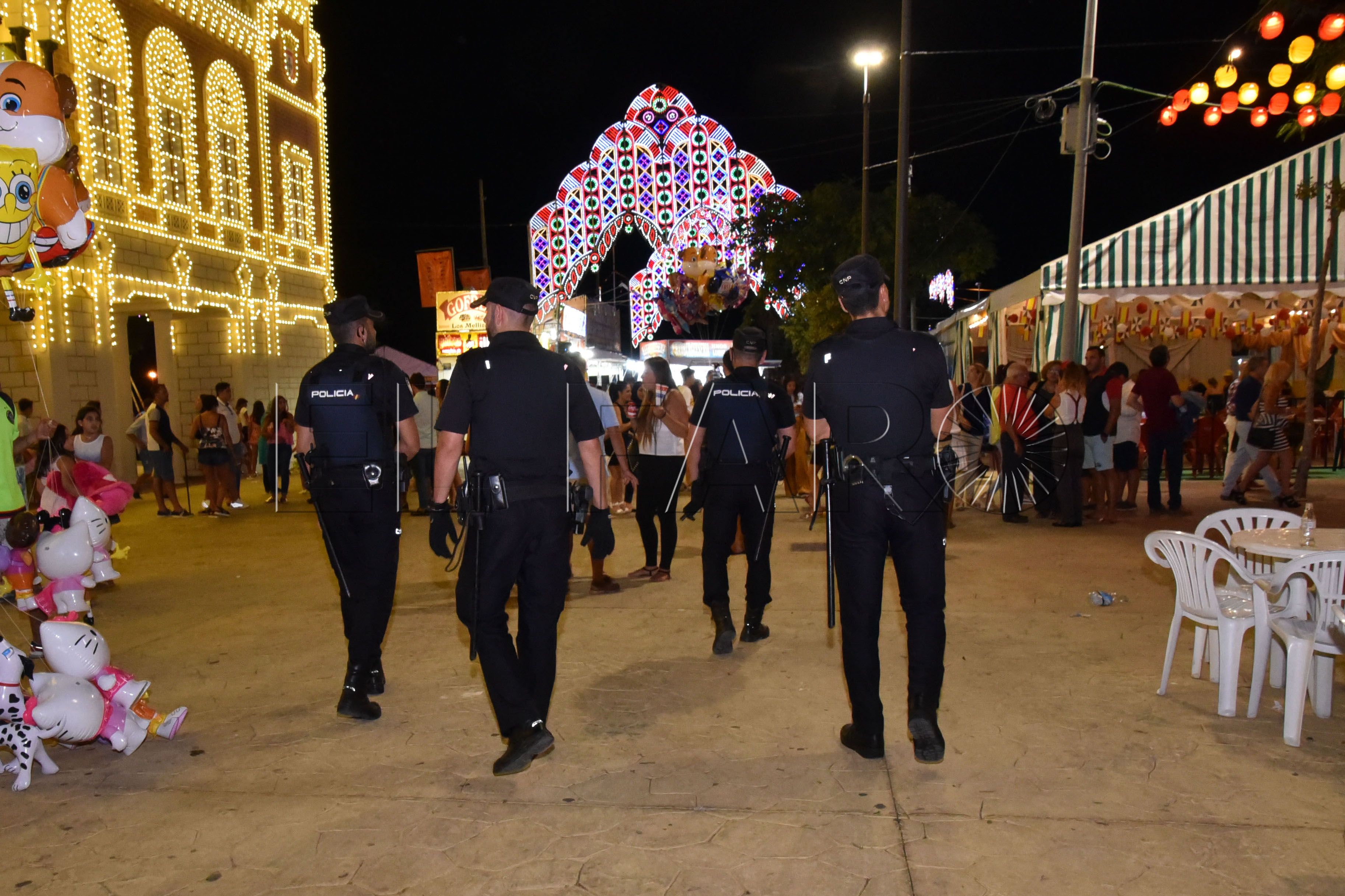 policia-nacional-espalda-feria